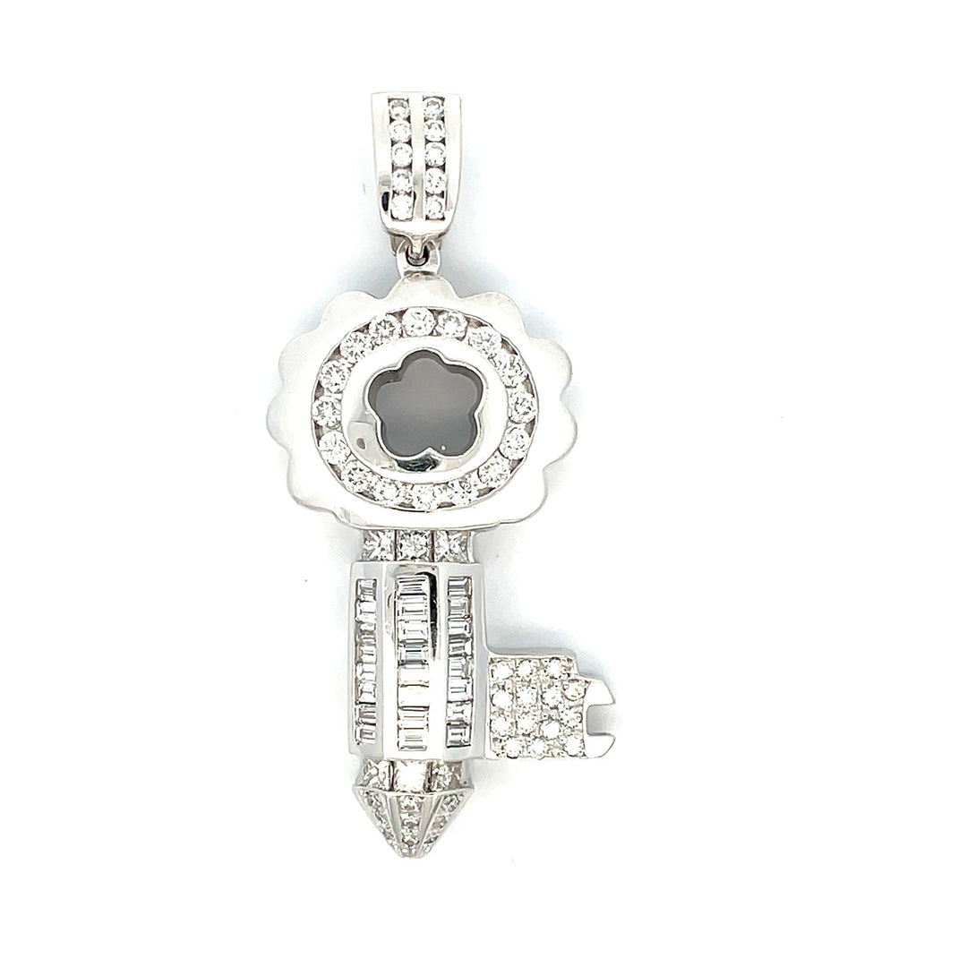2.50"" Flower-designed key pendant with channel set rounds, baguettes, princess cuts and pave set round diamonds.  D5.02ct.t.w.