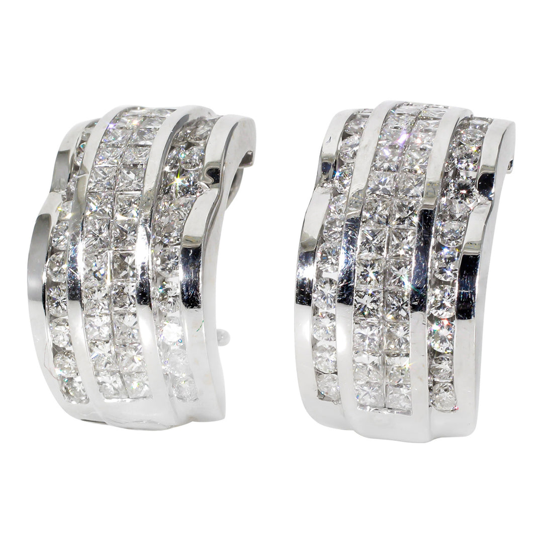 Scalloped style french clip earrings in 18K WG with 2-row invisible set princess cuts and channel set round diamonds.  D3.55ct.t.w.