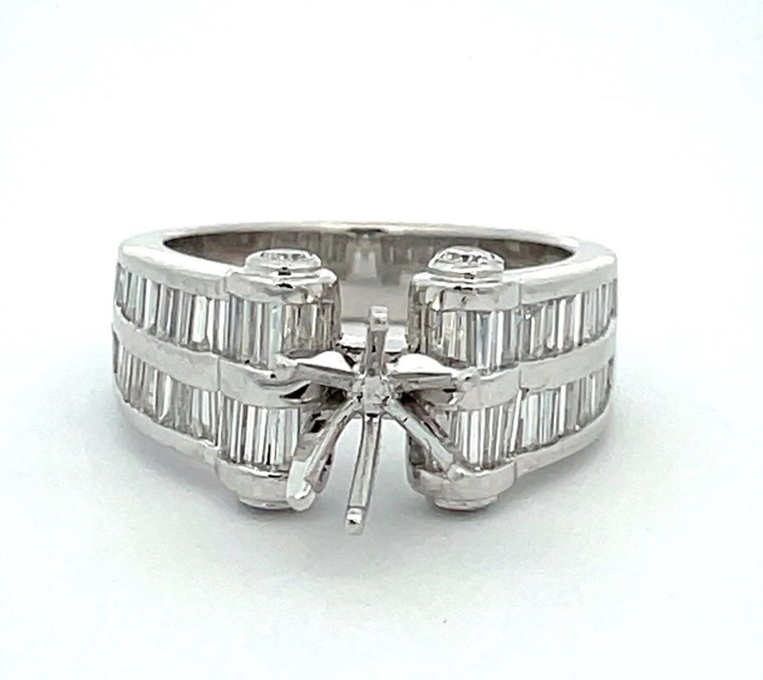 Scroll-top semi-mount in platinum with bezel set rounds on scrolls & channel set baguette diamonds.  D2.60ct.t.w.