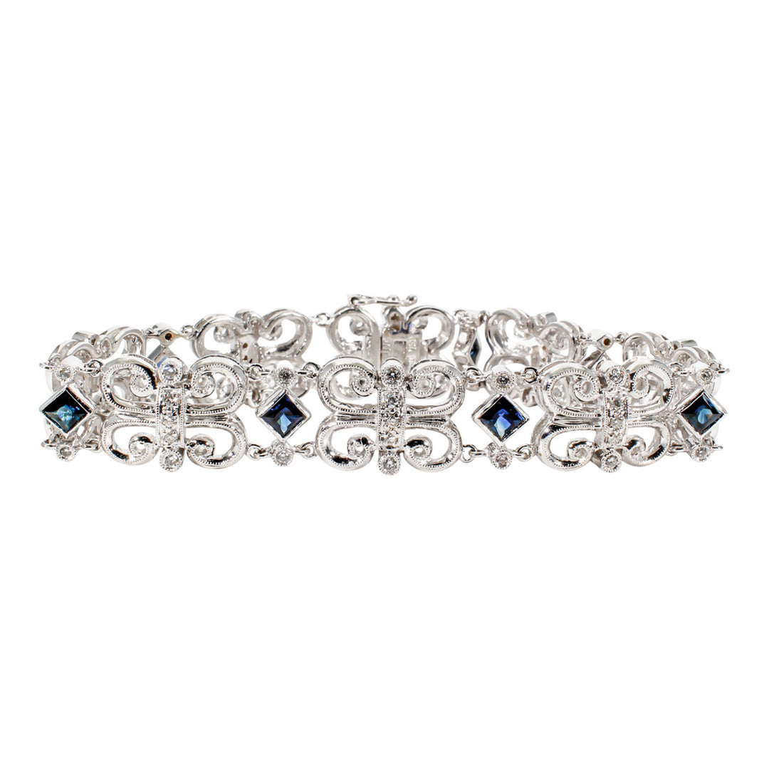 7"" Butterfly links bracelet in 18K WG with round diamonds & sapphires.  D0.63ct.t.w.  Sapphires 2.37ct.t.w.
