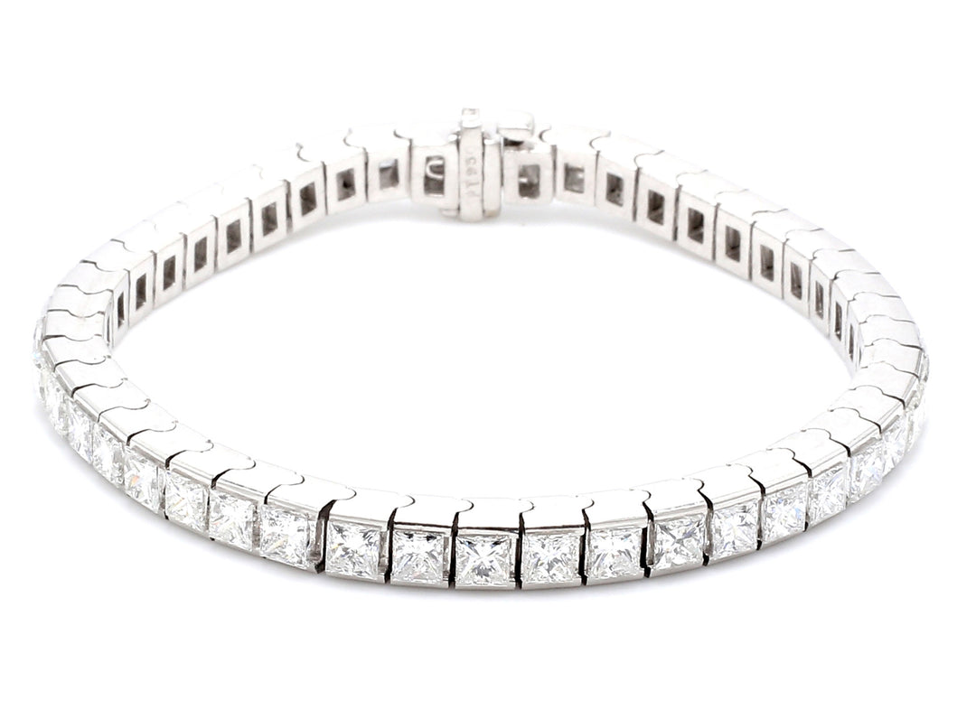 7"" Tennis bracelet in platinum with princess cut diamonds.  D12.01ct.t.w.
