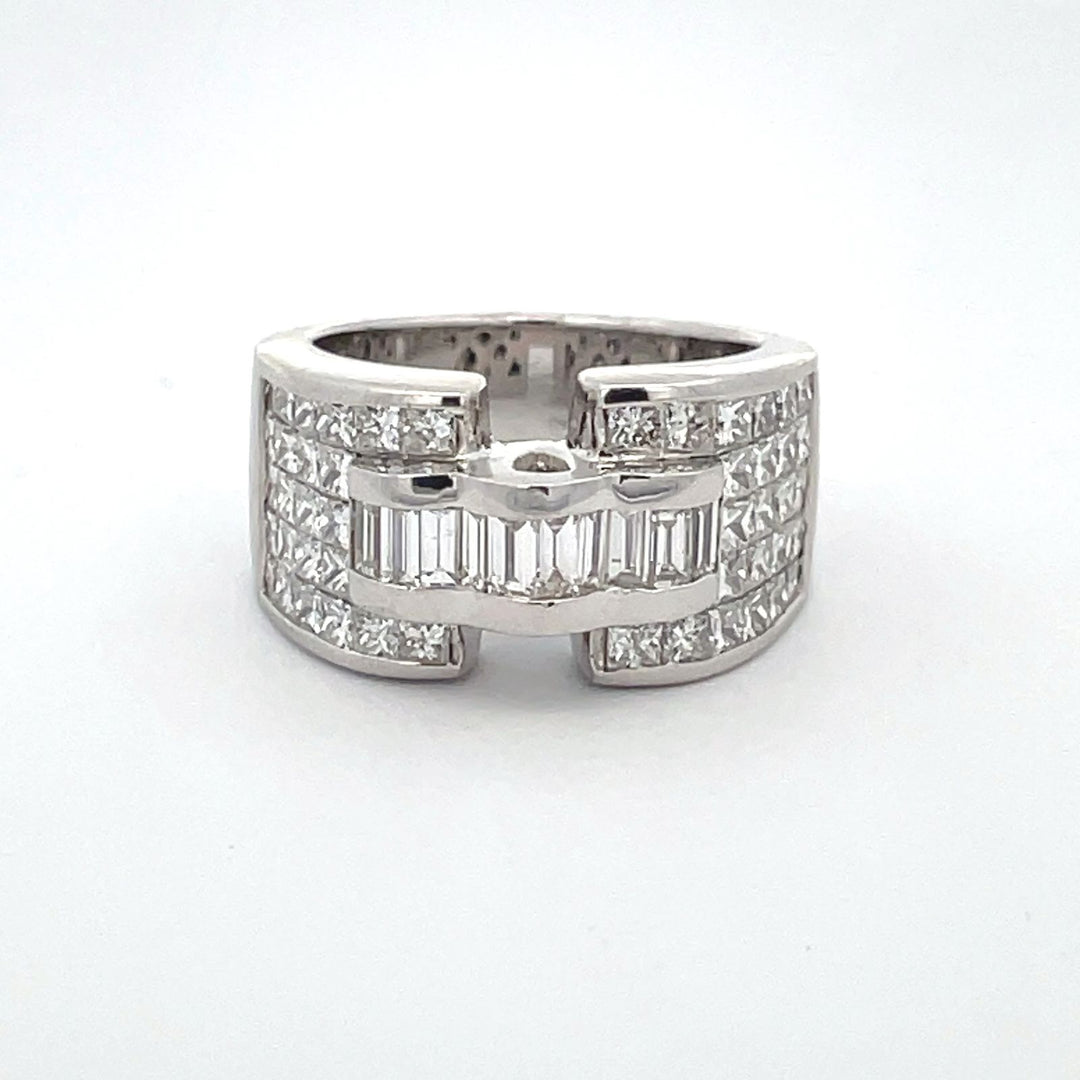Band in 18K WG with scallop shaped top, 5-row invisible set princess cuts & channel set baguette diamonds.  D2.55ct.t.w.