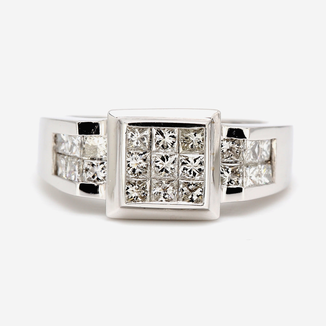 Ring with 3x3 princess cuts on the center & princess cut diamond on the sides.  D1.20ct.t.w.