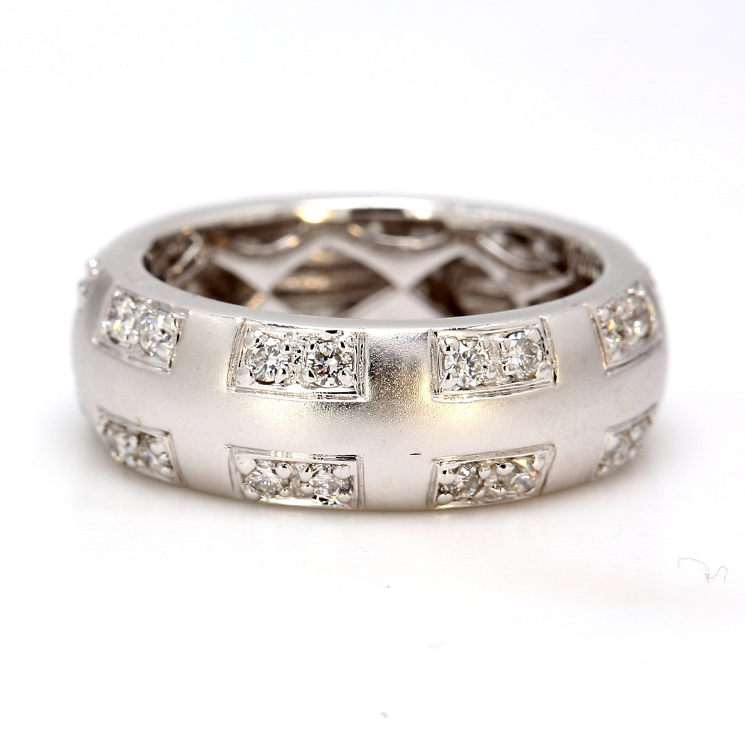 Eternity band brush finished with round diamonds.  D0.75ct.t.w.