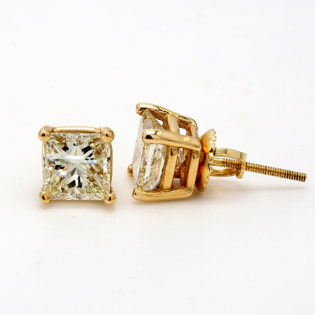 Screw back stud earrings in 14K YG with basket prong set USA certified H-I/SI2-SI3 princess cut diamonds.  D2.18ct.t.w.
