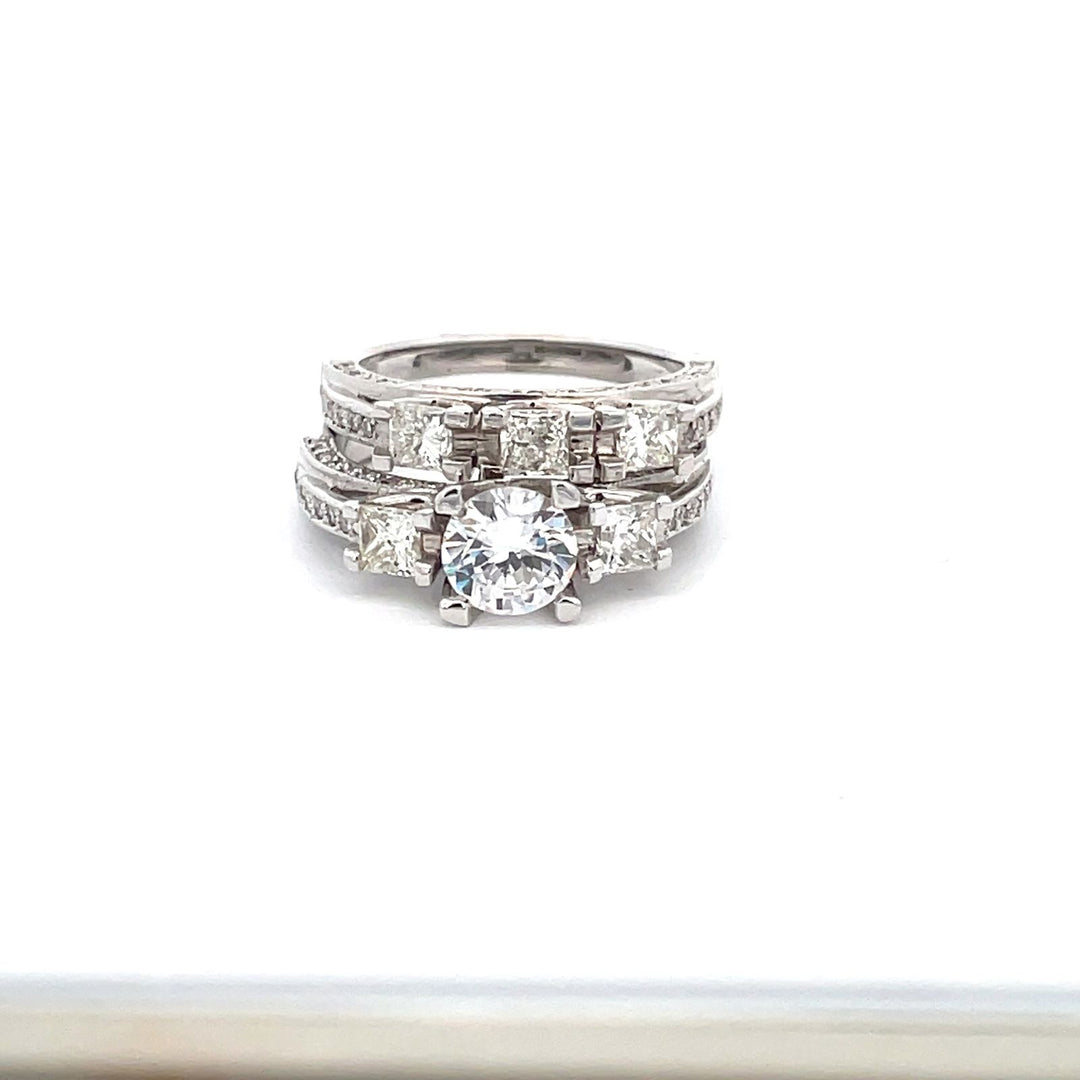3-stone wedding set in 18K WG with pave set rounds and 4-prong set princess cut diamonds.  D1.93ct.t.w.