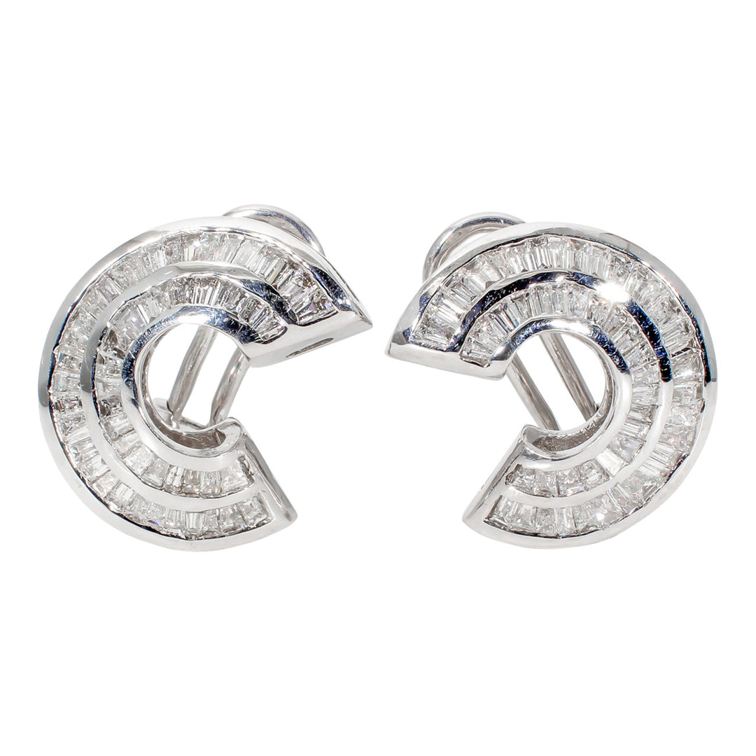 Curved french clip earrings with channel set tapered baguette diamonds.  D2.75ct.t.w.