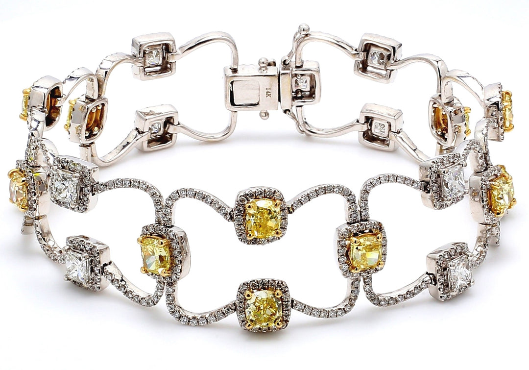 7"" Designer bracelet with rounds, princess cuts, & fancy yellow cushion diamond centers.  D12.91ct.t.w.  Fancy Yellow 6.05ct.t.w.