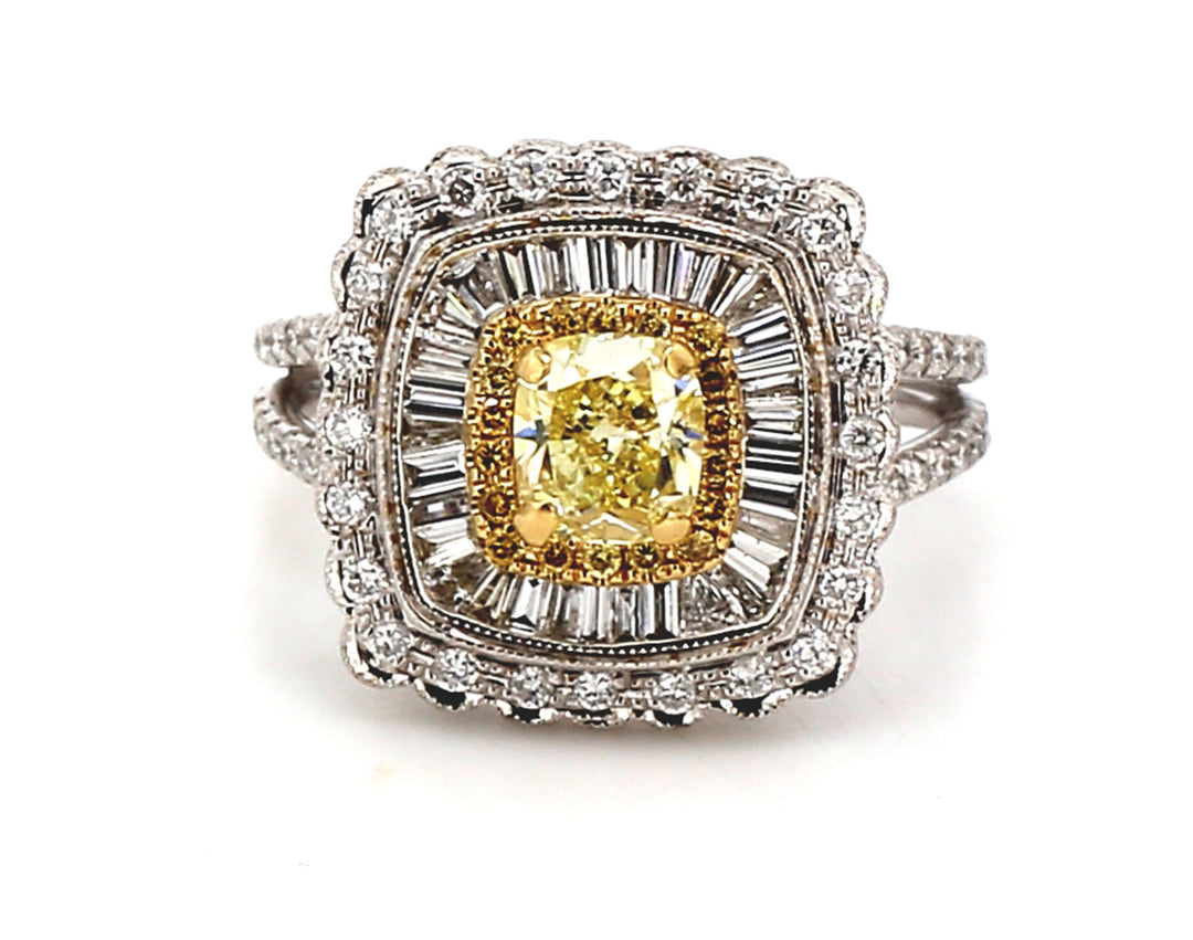 Halo split-shank ring with prong set FY cushion center, channel set baguettes, and pave set white and yellow round diamonds.  D1.99ct.t.w.  (Center - 0.80ct.)