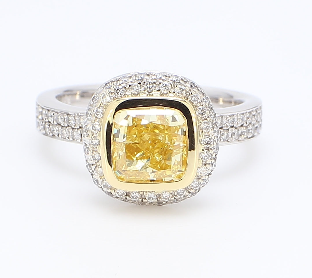 Halo ring with FIY/I1 GIA cushion center & round diamonds.  D2.57ct.t.w.  (Center 2.01ct.)  Size 6.25