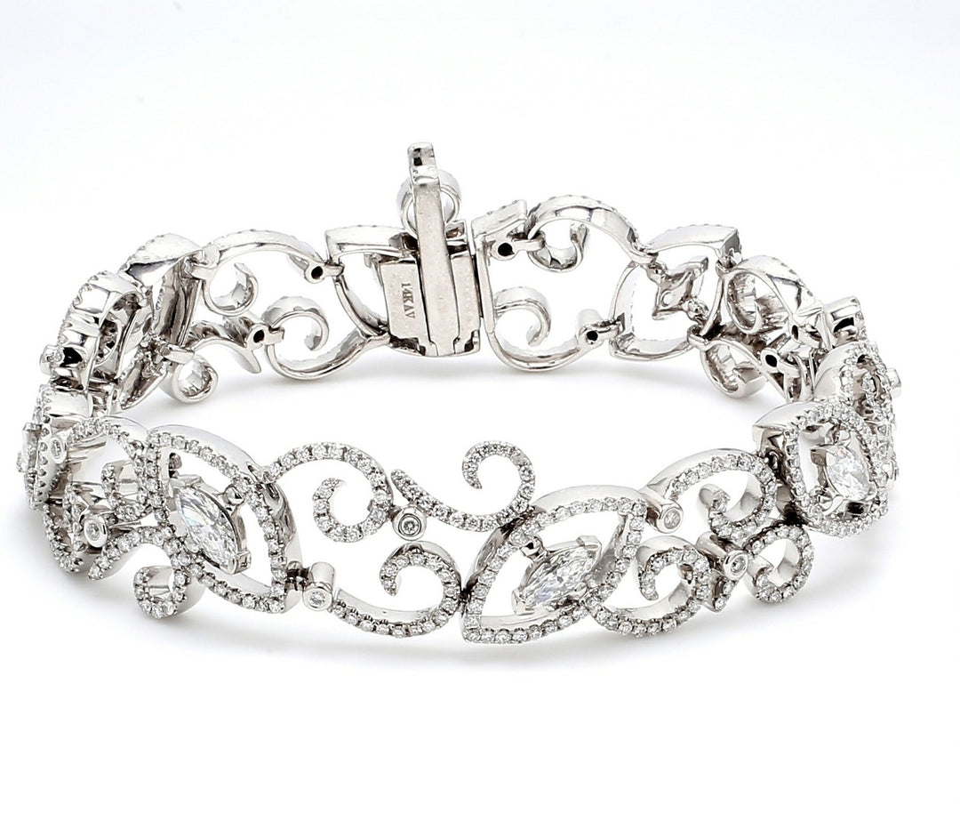 7"" Designer link bracelet with rounds around marquise diamonds.  D4.94ct.t.w.