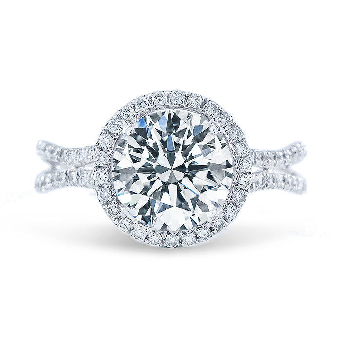 Double halo curved split-shank semi-mount with round diamonds.  D0.50ct.t.w.