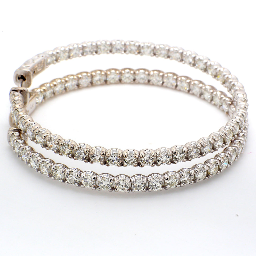 2"" Inside out hoop earrings with 4-prong set (78) round diamonds and special spring lock.  D7.04ct.t.w.