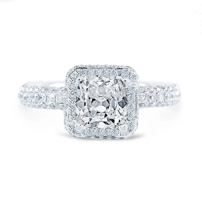 Halo semi-mount in 18K WG with round diamonds.  D1.31ct.t.w.  Size 6.5