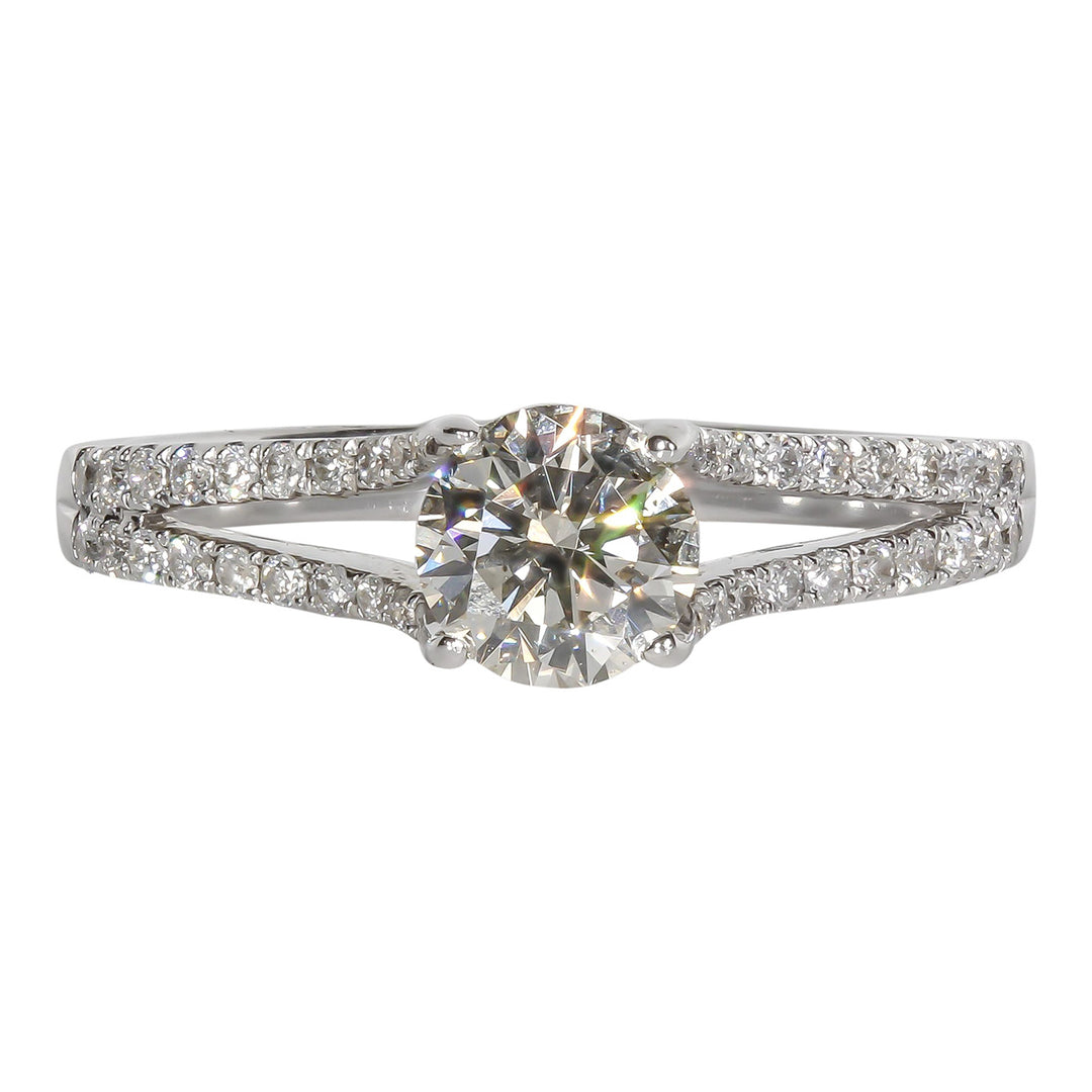 Split shank semi-mount in 18K WG with U-prong set round diamonds.  D0.22ct.t.w.