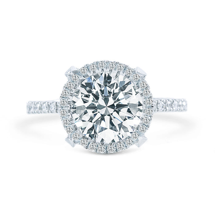Halo semi-mount in 18K WG with round diamonds.  D0.63ct.t.w.