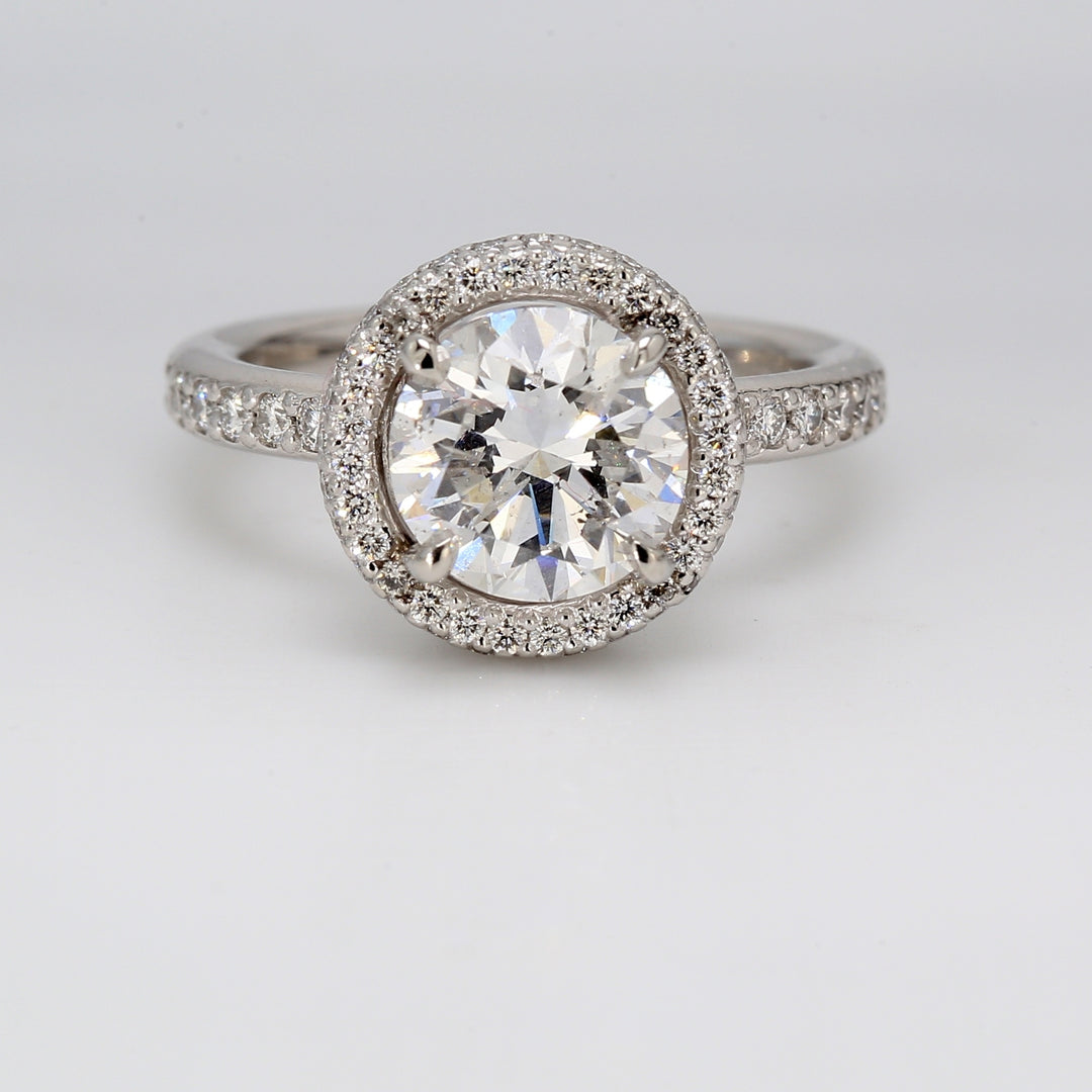 Halo semi-mount in platinum with round diamonds.  D1.00ct.t.w.