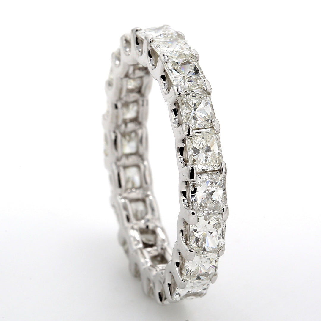 Eternity band with (20) radiant cut diamonds.  D3.31ct.t.w.  Size 6.25