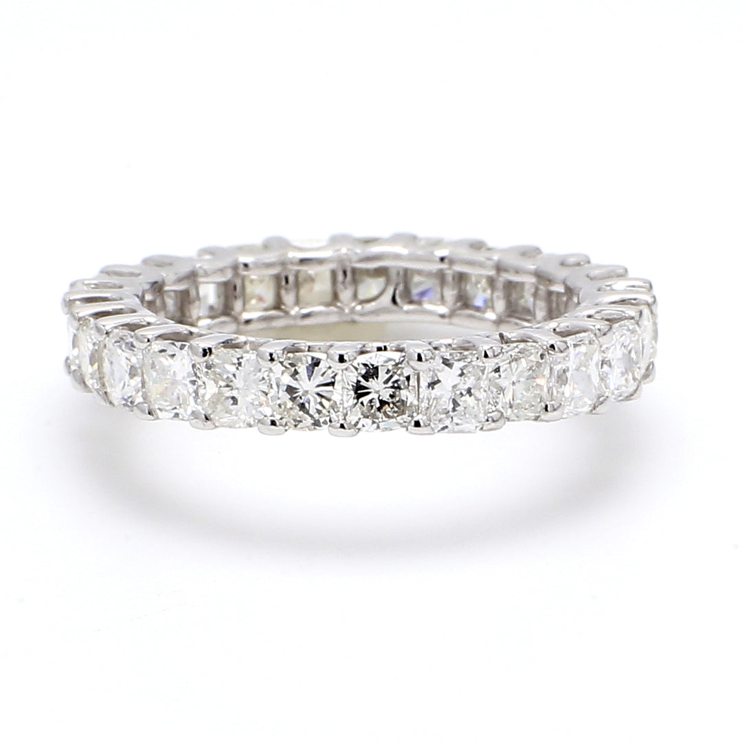 Eternity band in platinum with (23) cushion cut diamonds.  D3.50ct.t.w.