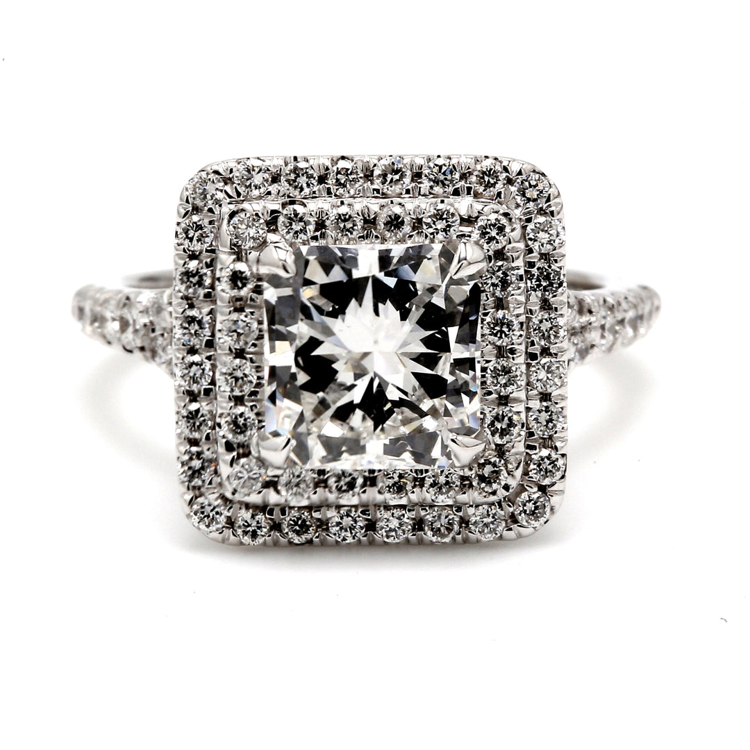 Double halo split shank semi-mount with prong set round diamonds.  D0.67ct.t.w.  Size 6.25