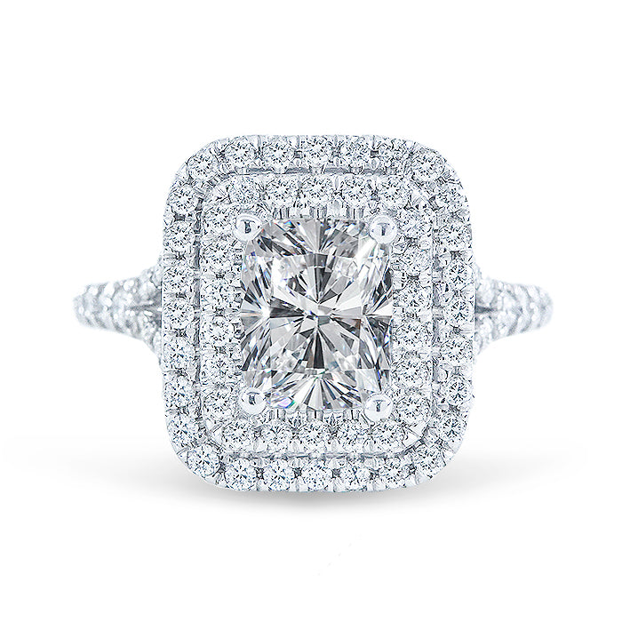 Double halo split shank ring with 4-prong set GIA certified E/SI2 radiant cut center stone and french pave set round diamonds.  D3.74ct.t.w.  (Center 3.01ct.)  Size 6.25