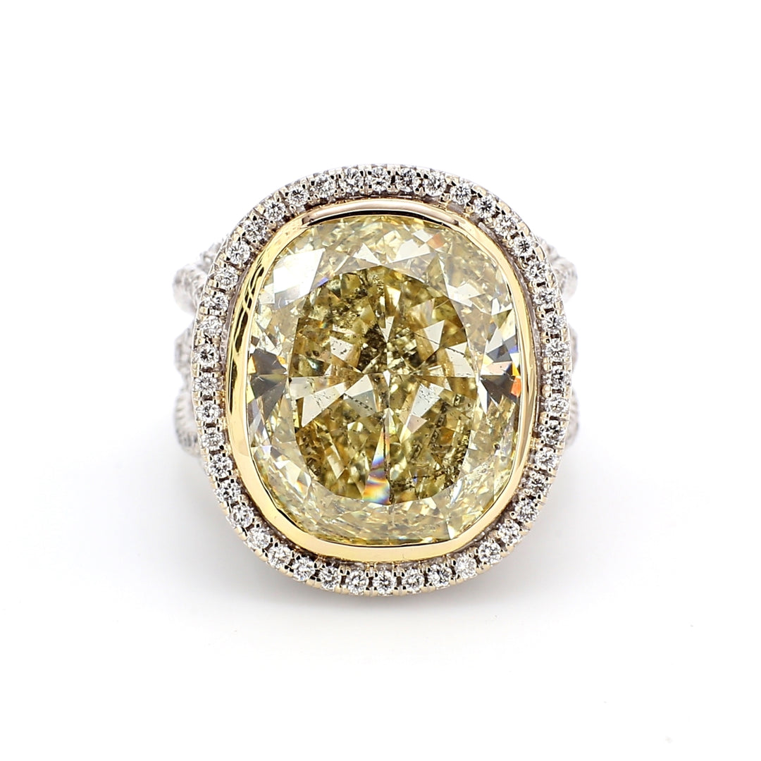 Halo multi-row shank web design ring in 18K WG with rounds & FLY/SI2 GIA cushion cut diamond center.  D15.36ct.t.w.  (Center 13.63ct.)