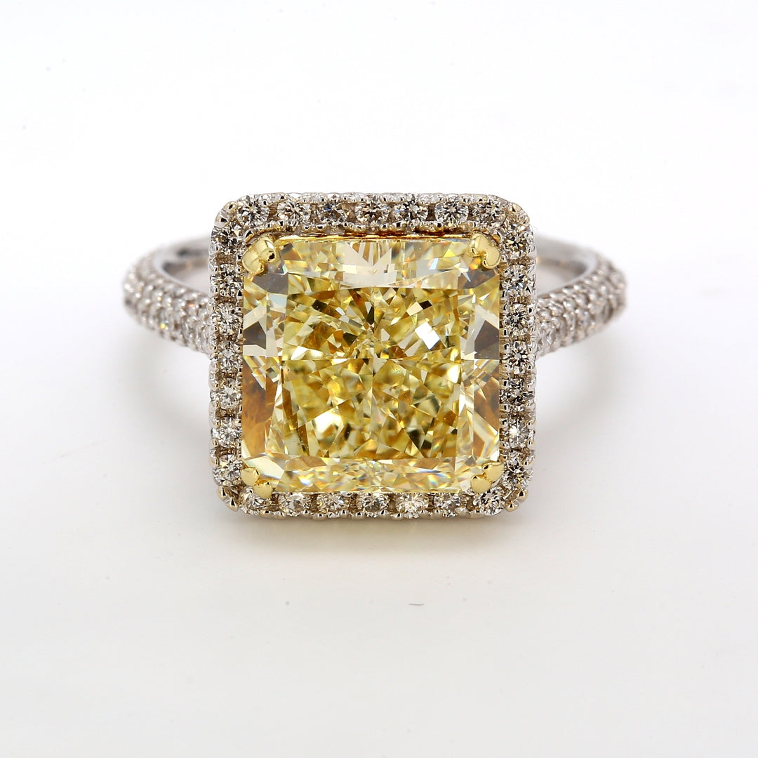Halo semi-mount in 18K WG with round diamonds.  D1.02ct.t.w.