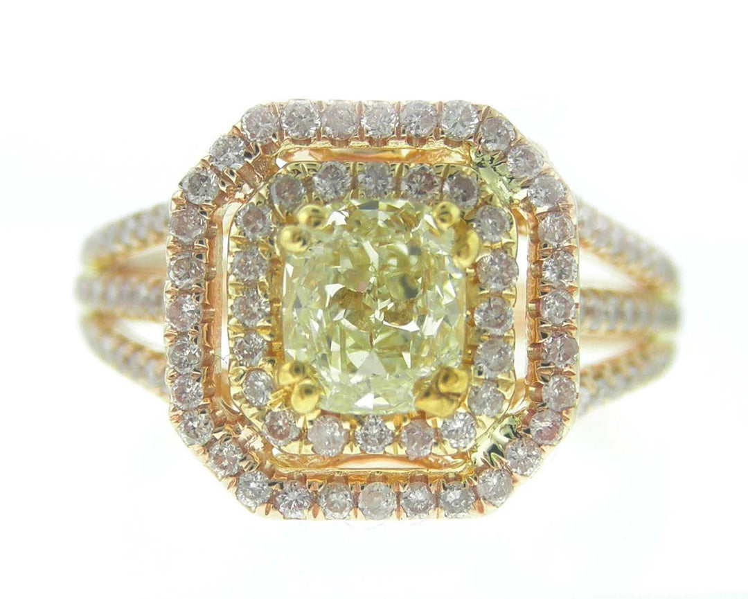 Double halo multi-shank ring in rose gold with French pave set pink rounds and double 4-prong set fancy yellow cushion cut diamond centerstone.  D1.16ct.t.w.