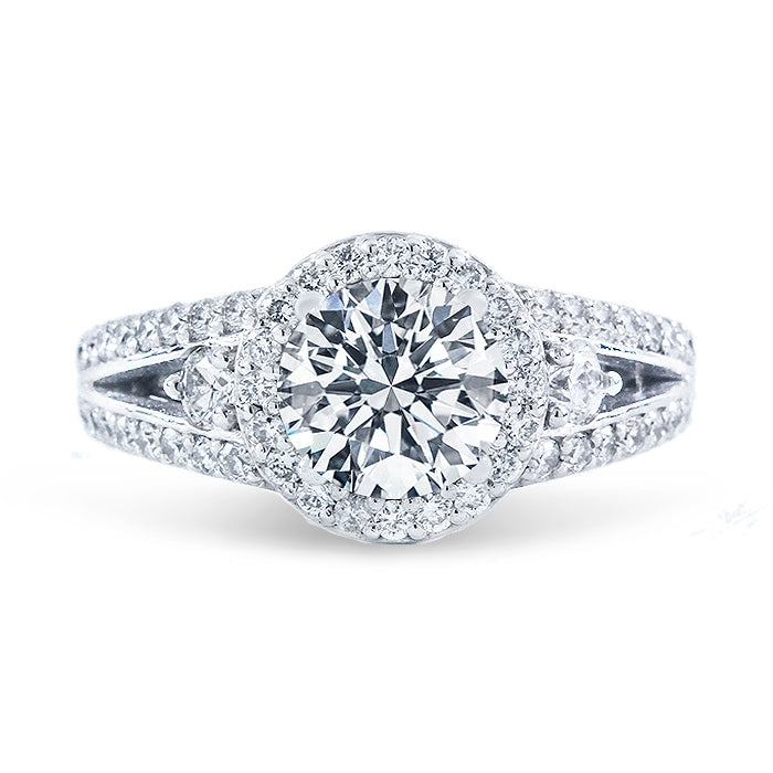 Halo split-shank semi-mount with 3-prong & shared prong set round diamonds.  D1.16ct.t.w.