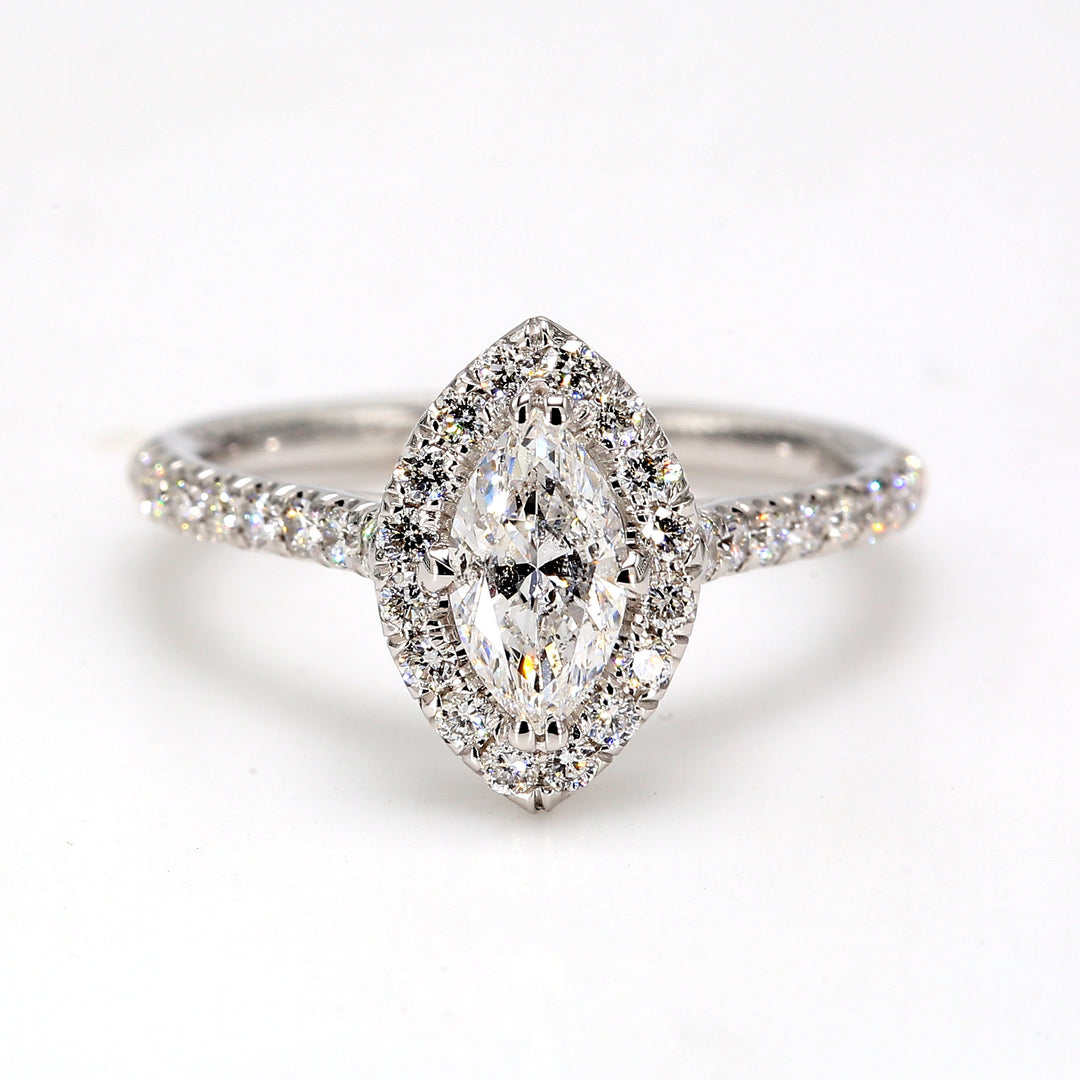 Halo ring with U-prong set rounds & 4-prong set marquise diamond center.  D1.11ct.t.w.  (Center 0.63ct.)