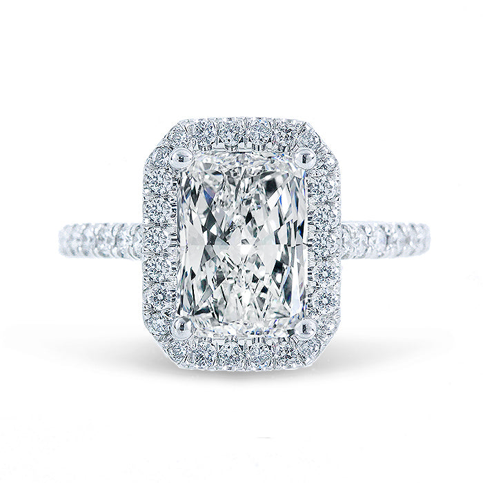 Halo semi-mount with U-prong set round diamonds.  D0.52ct.t.w.