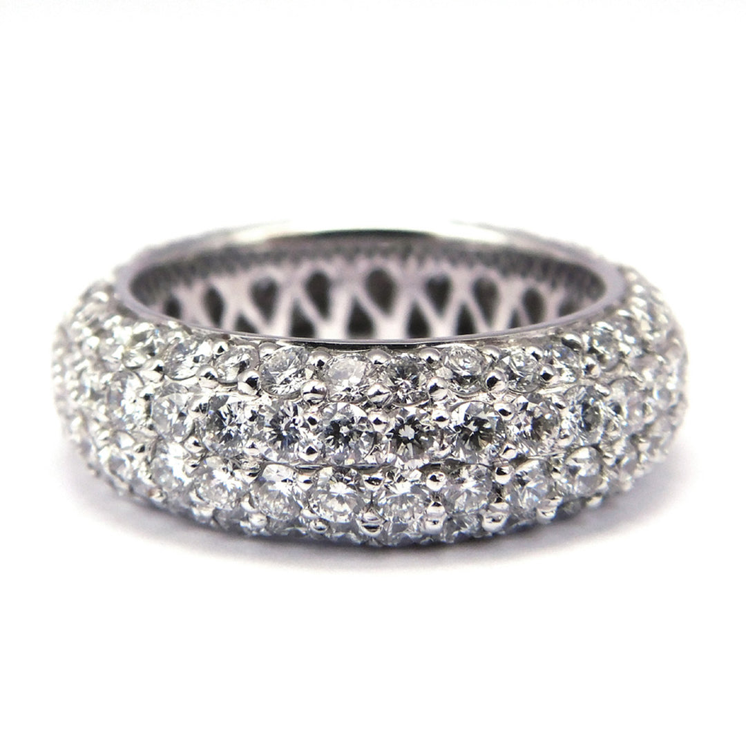 Eternity band in with French pave set 4 rows round diamonds.  D3.59ct.t.w.  Size 6