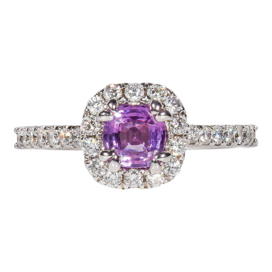 Halo ring with U-prong set rounds around a double 4-prong set pink sapphire center stone.  D0.38ct.t.w.  Sapphire 0.62ct.