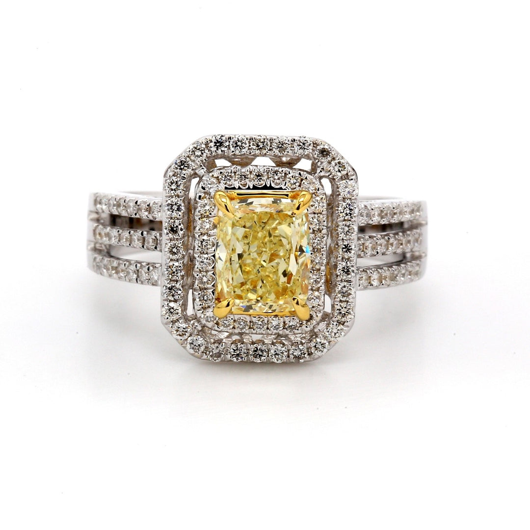 Double halo split-shank ring in 18K WG with GIA Certified FLY/VS2 cushion centerstone & french pave set round diamonds.  D1.69ct.t.w.  (Center 1.25ct.)  Size 6.5