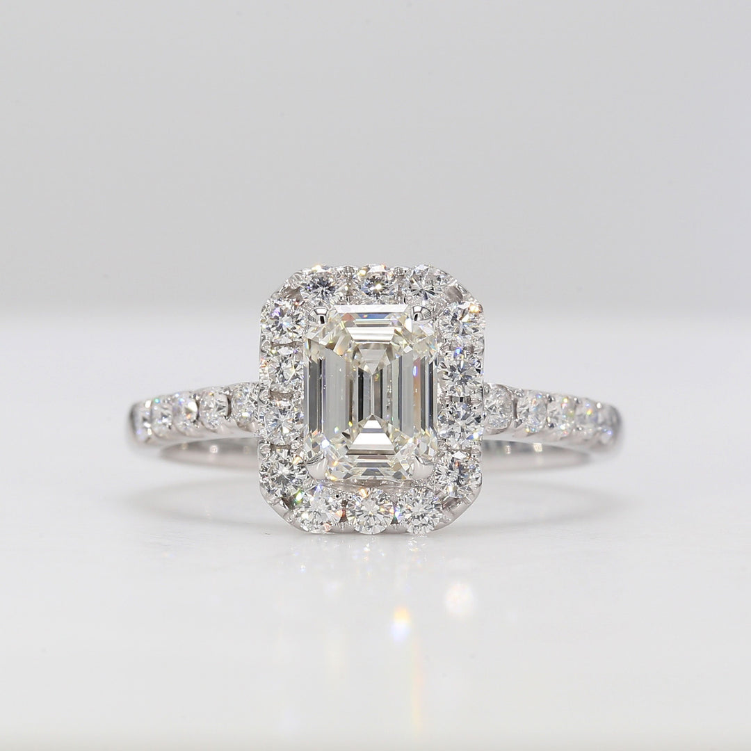Halo semi-mount in 18K WG with french pave set round diamonds.  D0.53ct.t.w.  Size 6.5