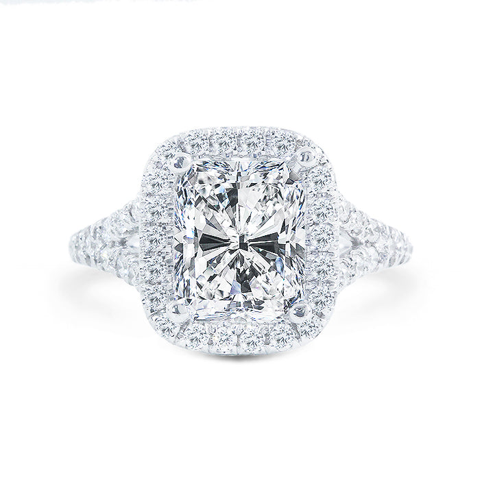 Halo split-shank semi-mount in 18K WG with U-prong set round diamonds.  D0.59ct.t.w.