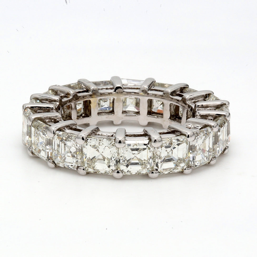 Eternity band in 18K WG with shared prong set (17) asscher cut diamonds.  D8.38ct.t.w.