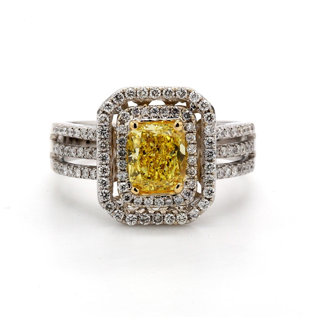 Double halo triple shank ring in 18K WG with 4-prong set GIA certified FVY/SI2 radiant cut center & french pave set round diamonds.  D1.53ct.t.w.  (Center 1.09ct.)  Size 6.25