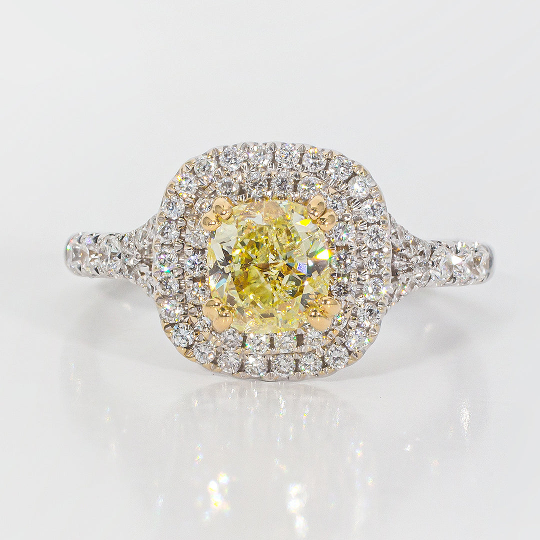 Double halo split shank ring in 18K WG with prong set rounds around FY cushion cut diamond center stone.  D1.49ct.t.w.  (Center 1.00ct.)