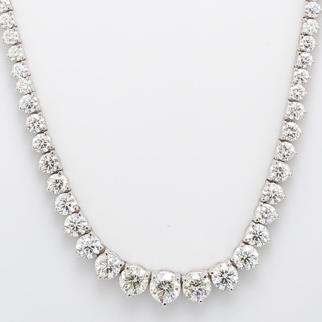 Graduated tennis necklace with 3-prong set round diamonds.  D12.44ct.t.w.