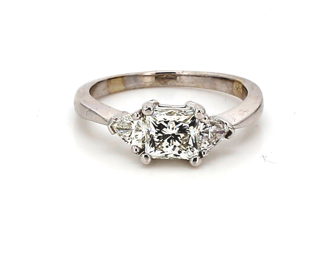3-stone ring with USA certified I/VS2 princess cut center and trilliant diamond sides.  D1.74ct.t.w.  (Center - 1.21ct.)