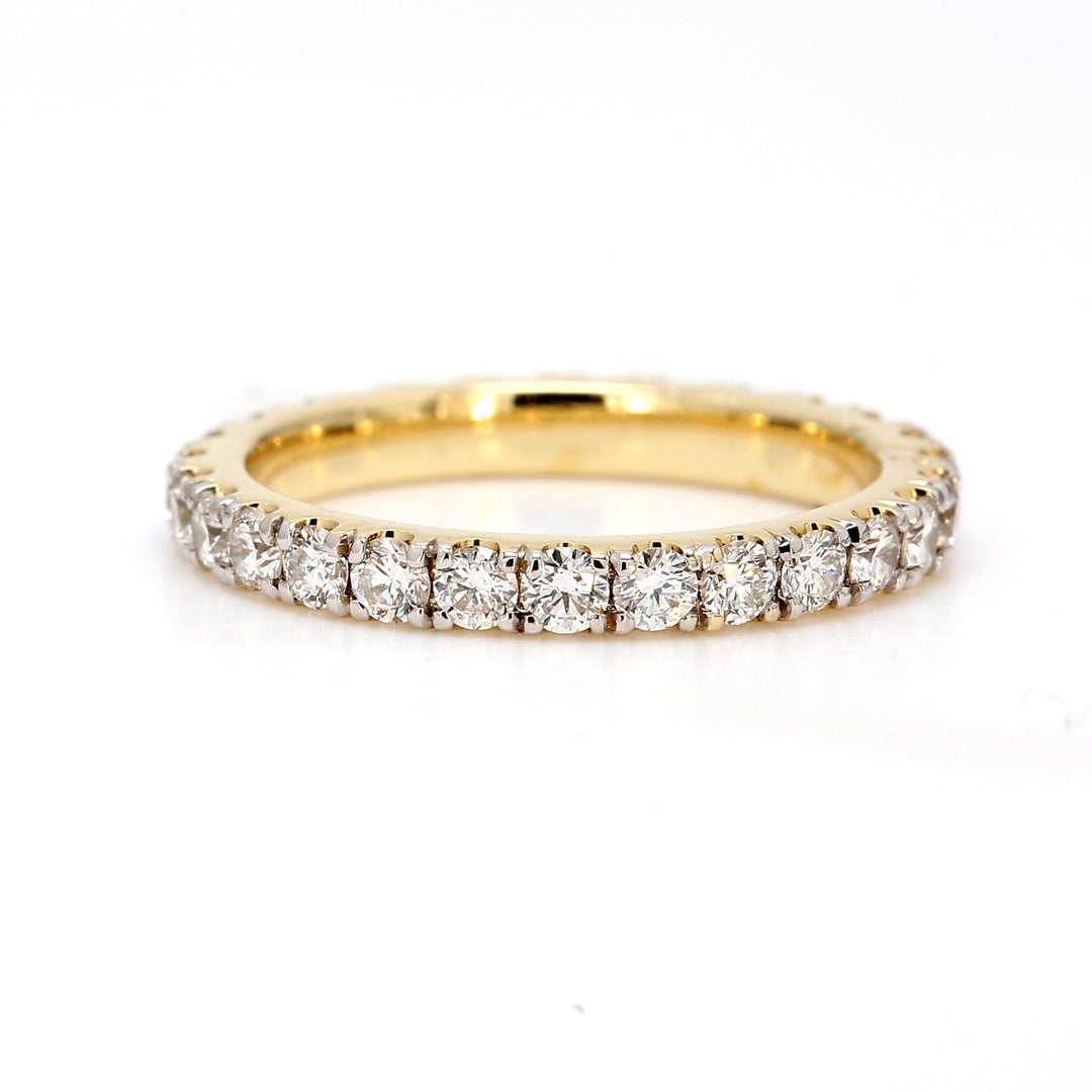 Eternity band with prong set round diamonds.  D1.00ct.t.w.
