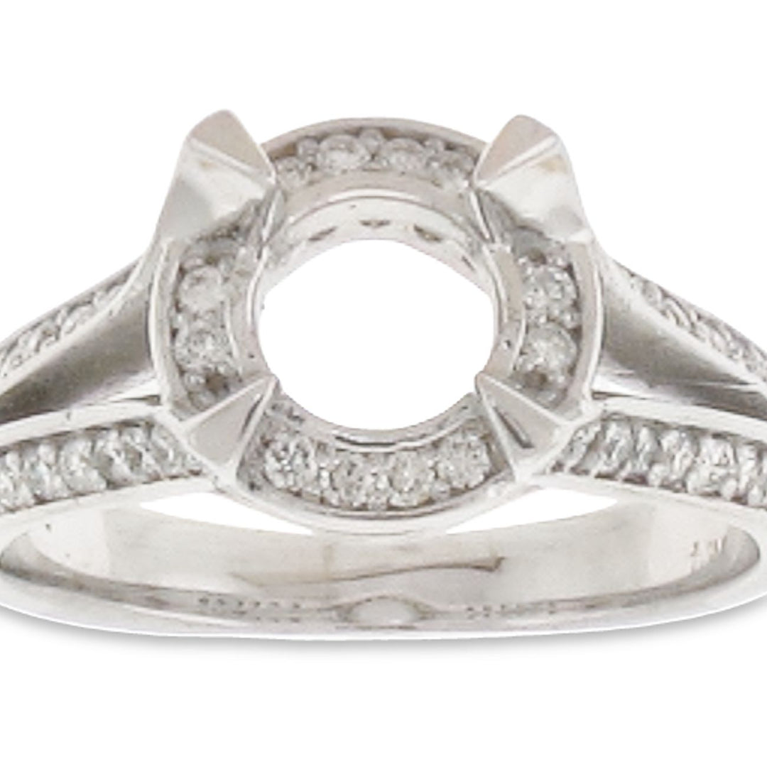 Halo split shank semi-mount with pave set round diamonds.  D0.59ct.t.w.