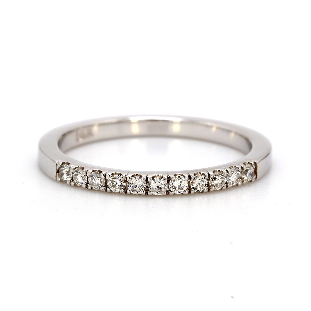 Band with U-prong set round diamonds.  D0.21ct.t.w.