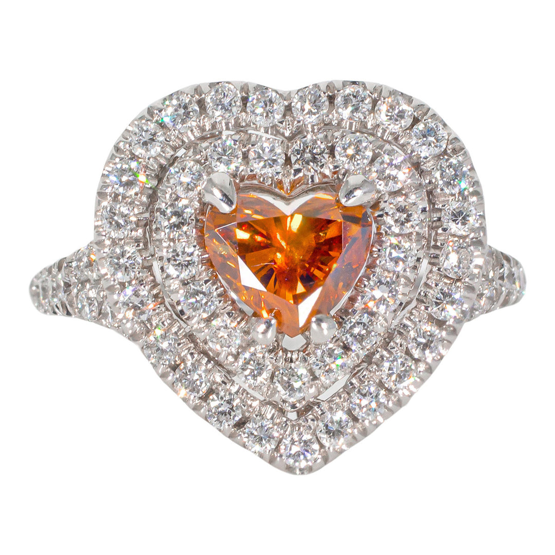 Double halo split-shank ring with claw set GIA certified FDBYO/SI2 heart shape center & U-prong set round diamonds.  D1.61ct.t.w.  (Center 0.86ct.)  Size 6.25