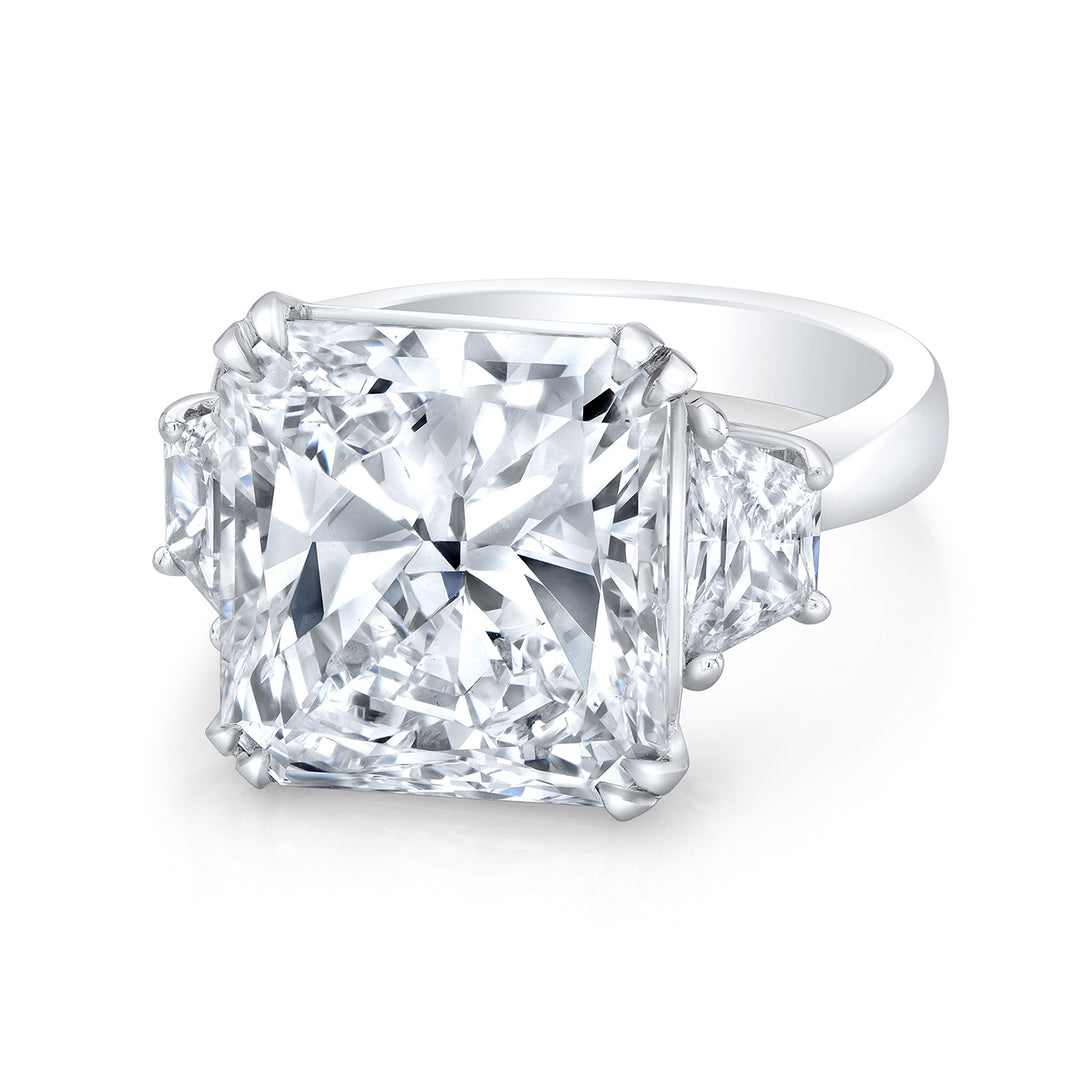 3-stone semi-mount ring in platinum with trapezoid diamond sides.  D0.85ct.t.w.  Size 6.25