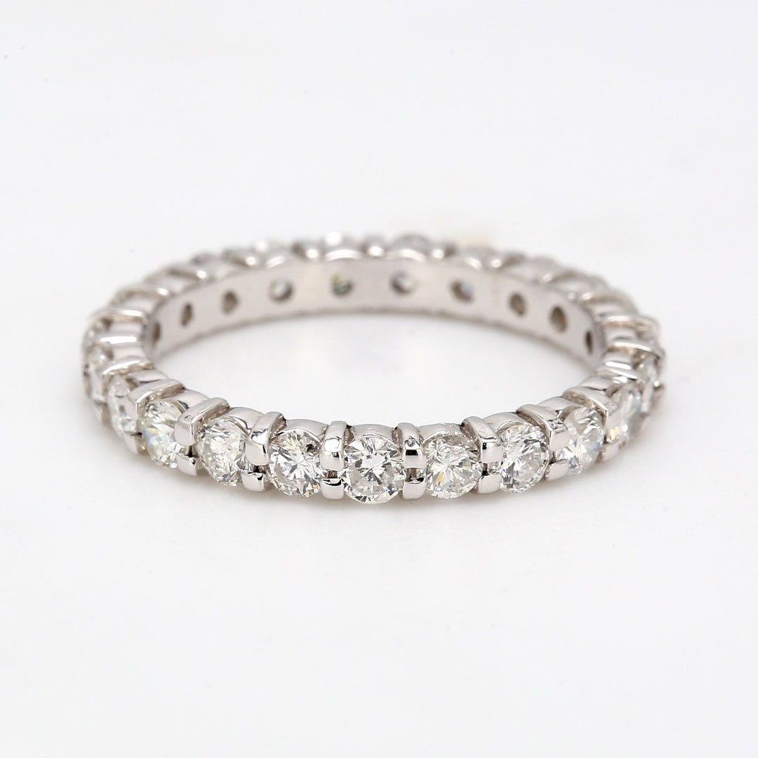 Eternity band with shared prong set (23) round diamonds.  D1.53ct.t.w.  Size 6.75