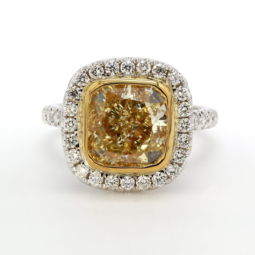 Halo semi-mount in 18K WG with prong set round diamonds.  D0.84ct.t.w.