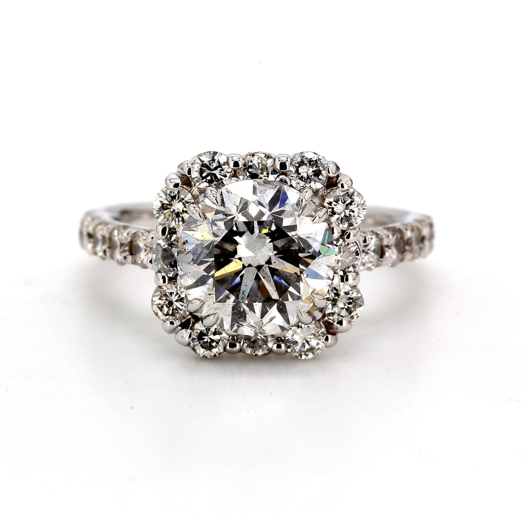Halo semi-mount with prong set round diamonds.  D1.16ct.t.w.