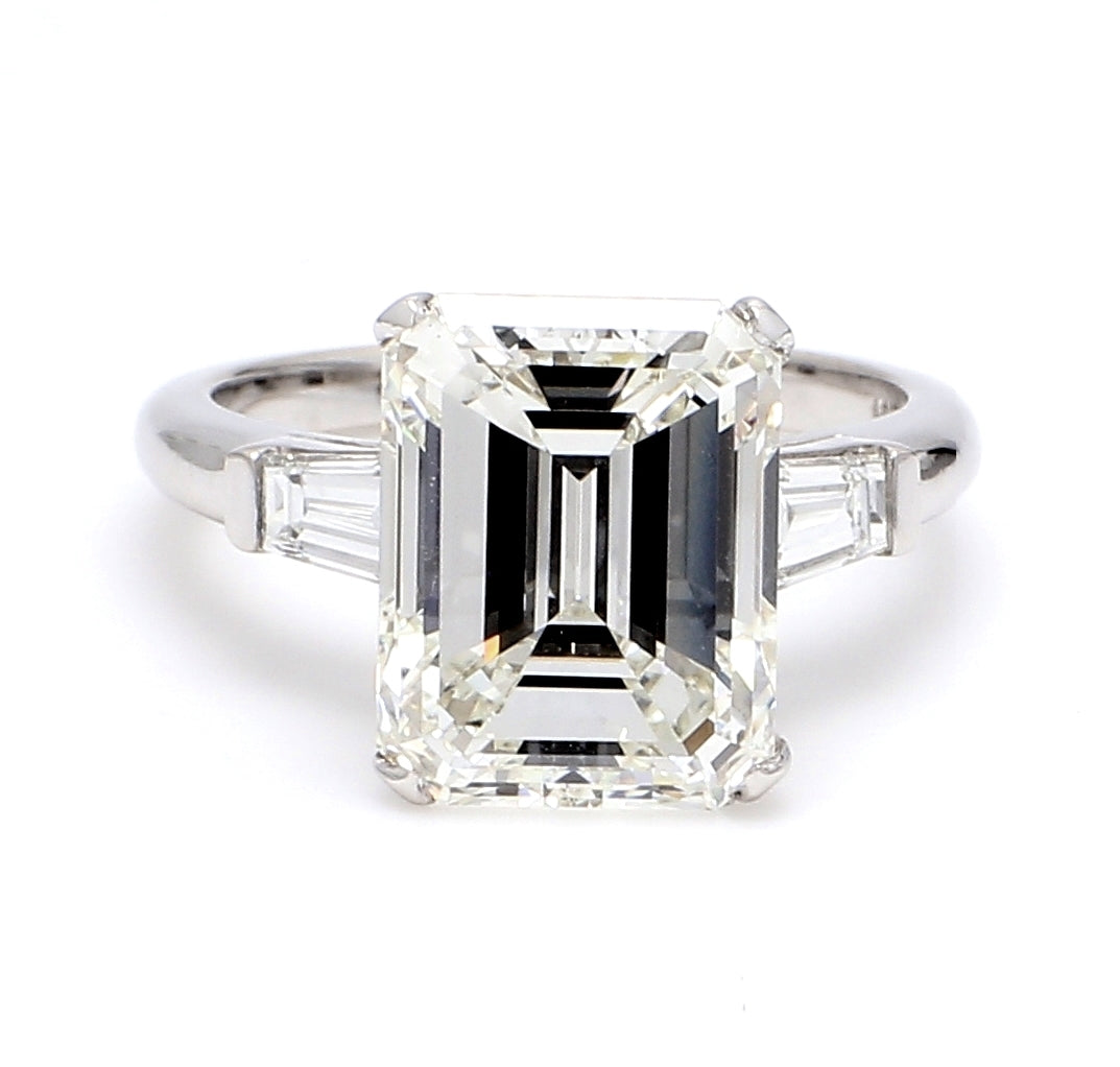 3-stone ring in 18K WG with GIA certified I/VS2 emerald cut center and tapered baguette diamond sides.  D6.58ct.t.w.  (Center 6.01ct.)